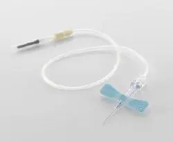 A medical butterfly needle with tubing used for venipuncture.