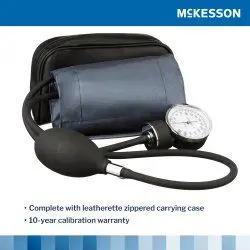 Blood pressure cuff with gauge and carrying case.