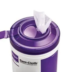 Purple container dispensing a wet wipe.