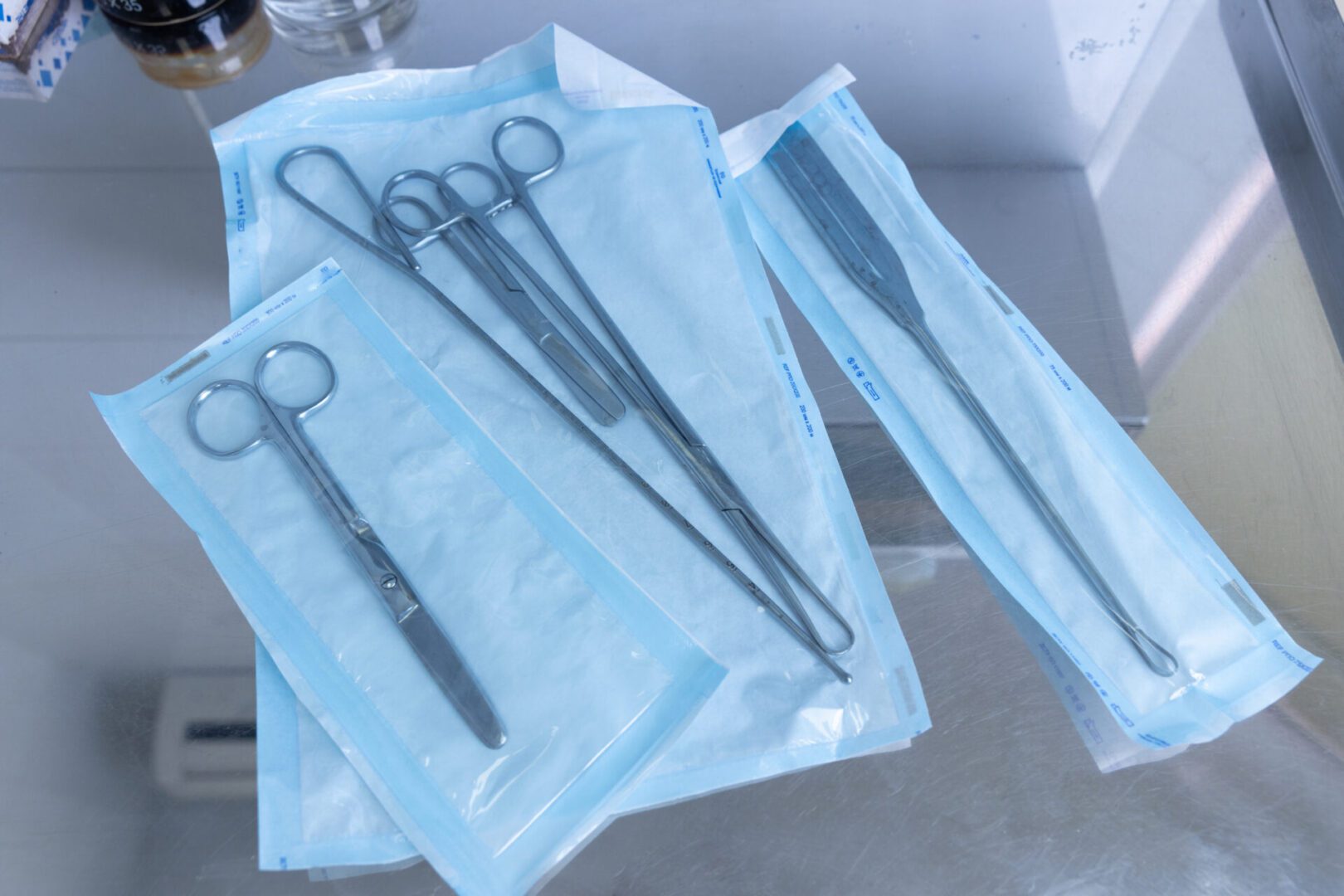 Sterilized medical instruments in sealed packages.